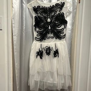 White and black dress. Would make a great dance costume